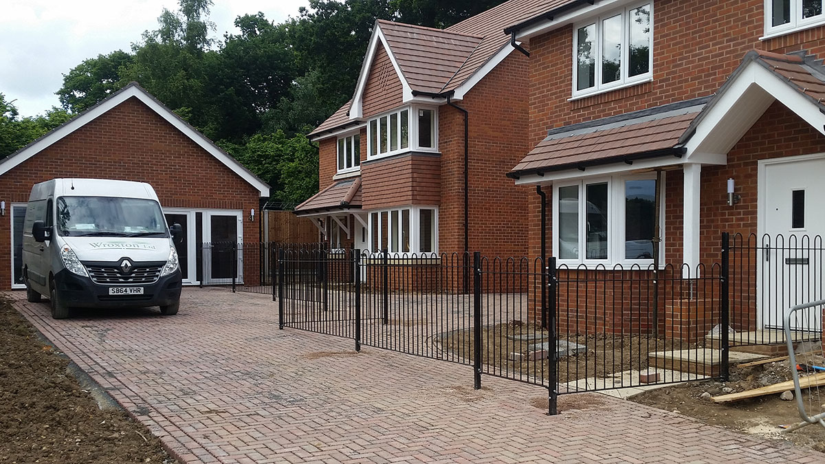 Metal railing installation for new home developments